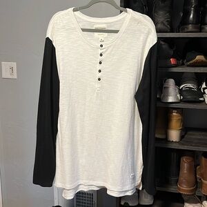 Black long sleeved white body shirt with 5 buttons